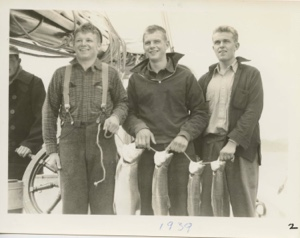 Image of Andy, Eggie and Cornie with fish. Fred Edgarton, Andy Jencks and Bill Deacon